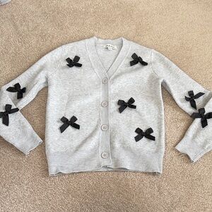 Girls gray sweater with black bows sz m